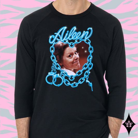 Aileen Wuornos photo and blue chain heart graphic on an all black unisex raglan shirt