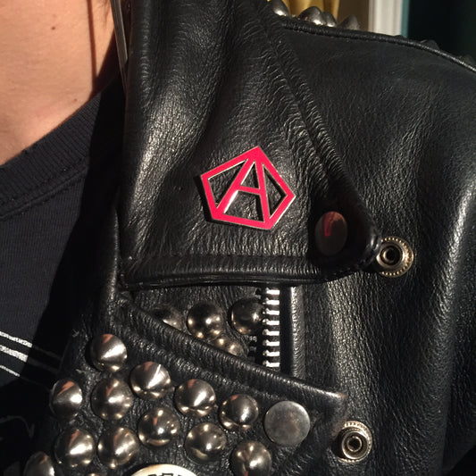 The System Anarchy Red Enamel Pin
