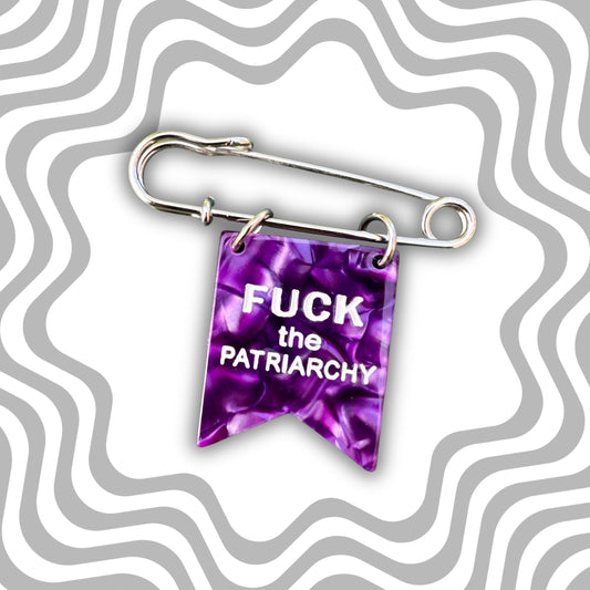 Purple ribbon with text 'Fuck the Patriarchy' on a wavy gray background