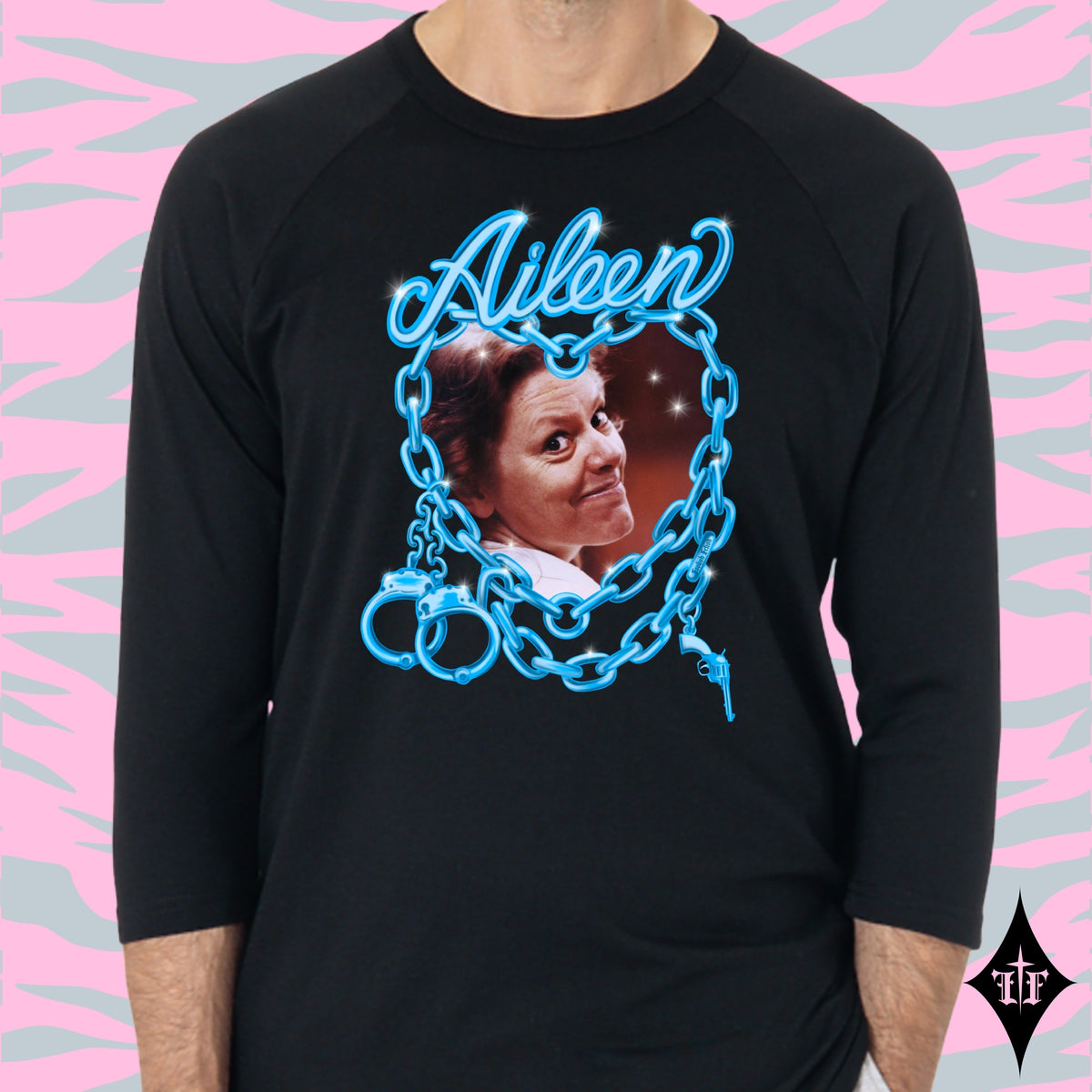 Aileen Wuornos photo and blue chain heart graphic on an all black unisex raglan shirt