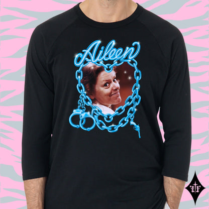 Aileen Wuornos photo and blue chain heart graphic on an all black unisex raglan shirt