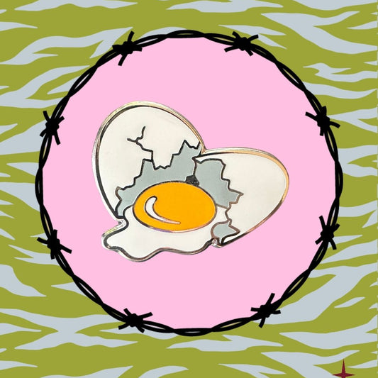Illustration of a cracked egg with a pink circle and barbed wire on a green and blue patterned background.