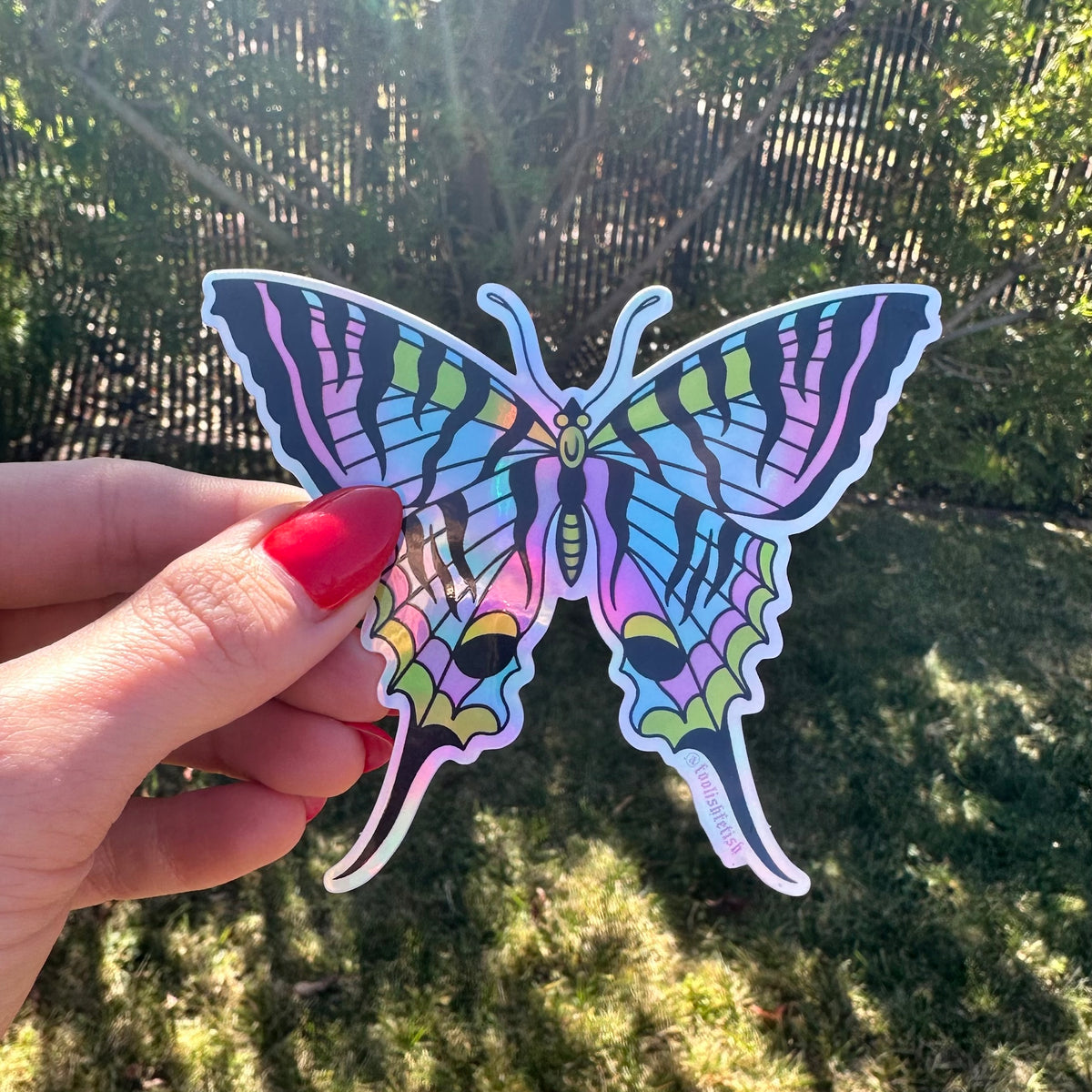 holographic butterfly sticker in traditional tattoo style illustration