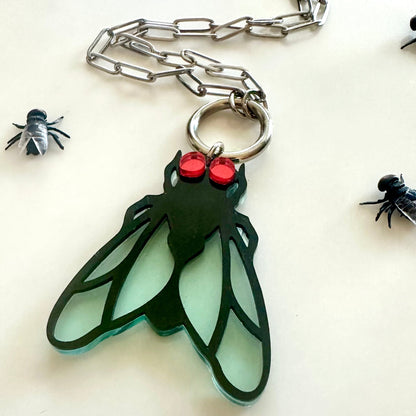 Keychain with insect design on a white background