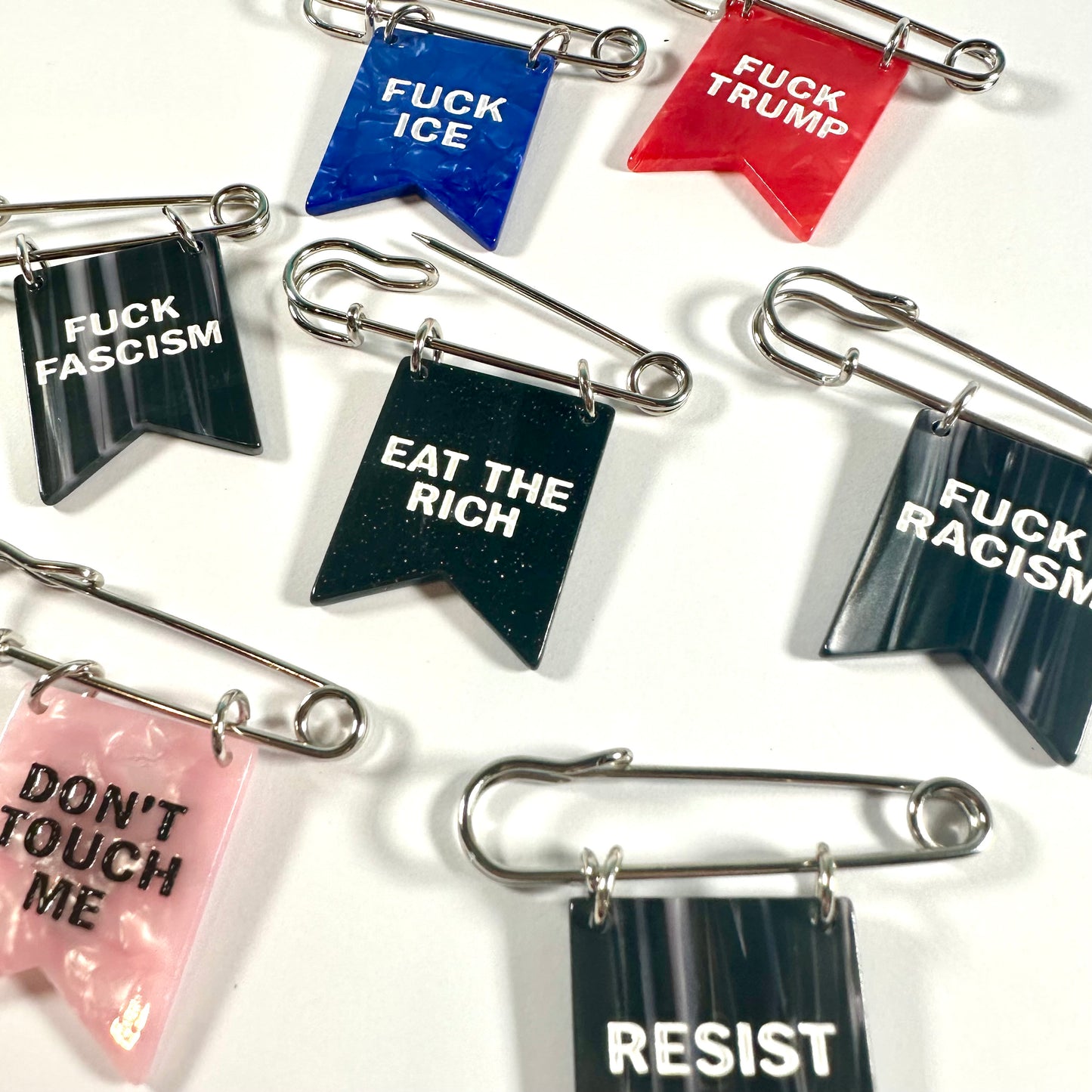 Eat the Rich Banner Ribbon Safety Pin