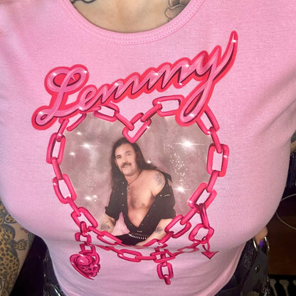 Person wearing a pink tank top with a graphic design of a man and the word 'Lenny'.